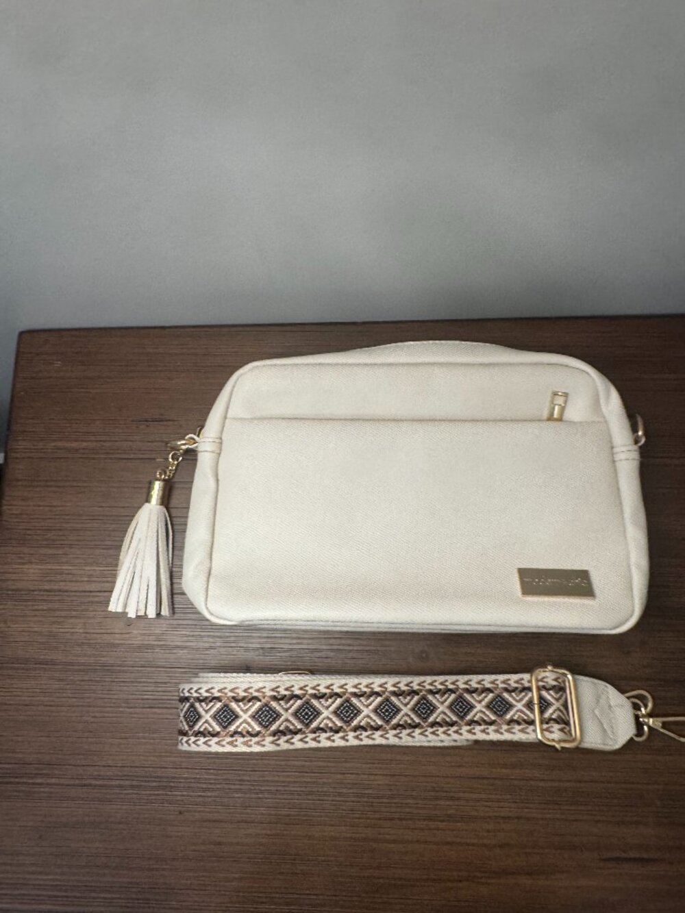 Cream Crossbody Bag with Tassel Accent